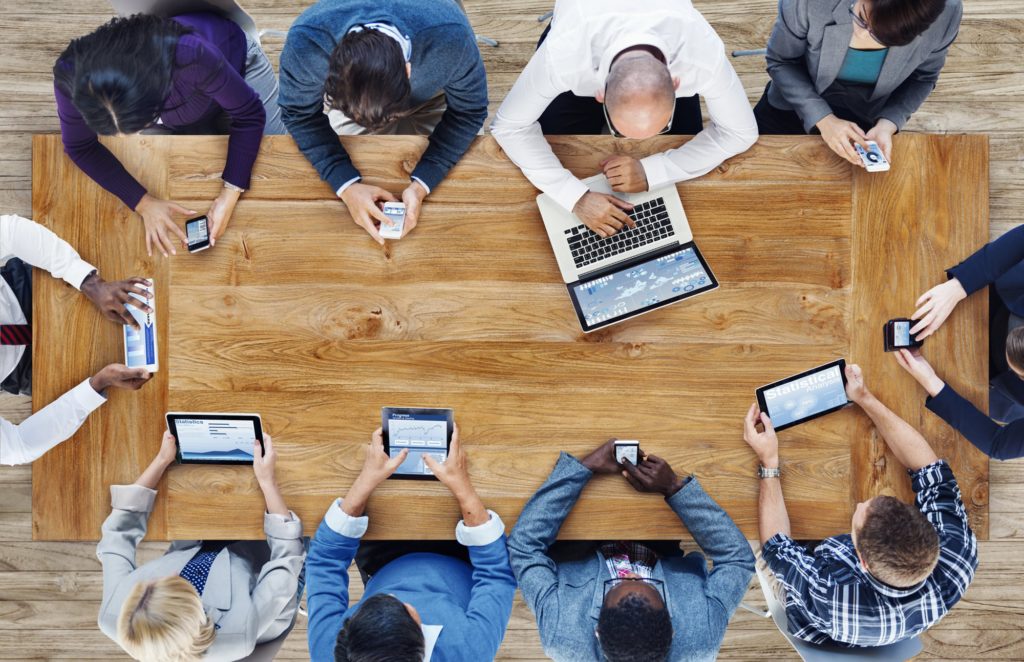 Business people strategizing around a conference table